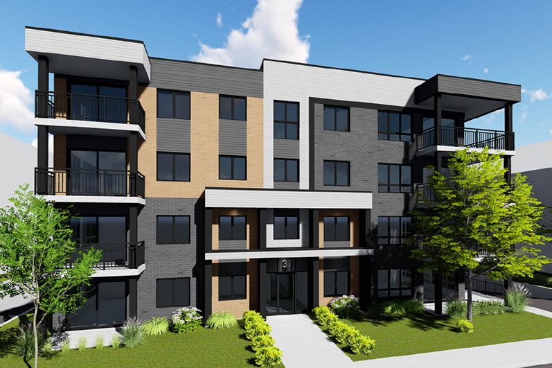 Immeuble d'appartements neufs à louer à Laval : trois étages, brique pâle et bois, balcons
